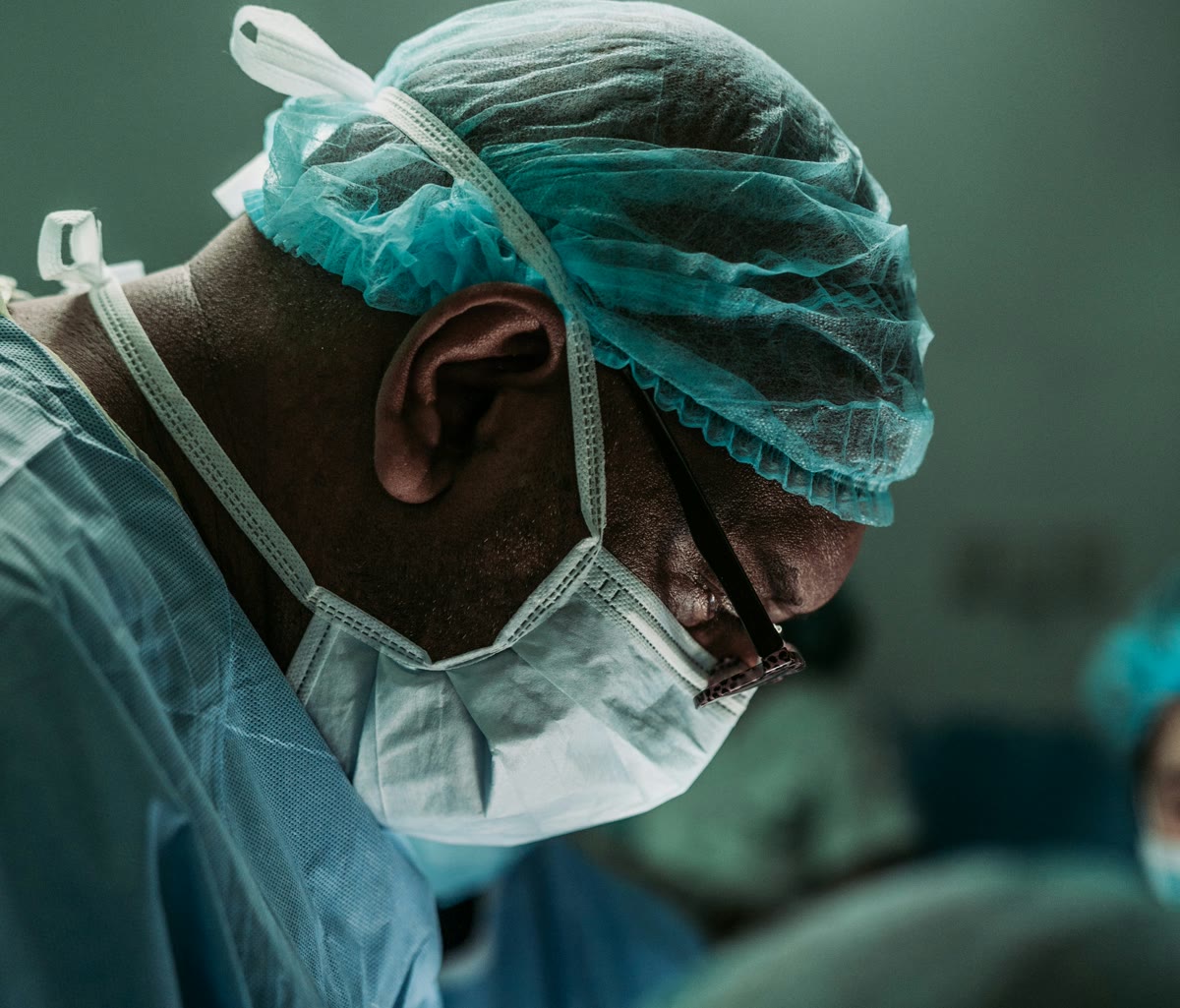 A surgeon in the operating room during a procedure